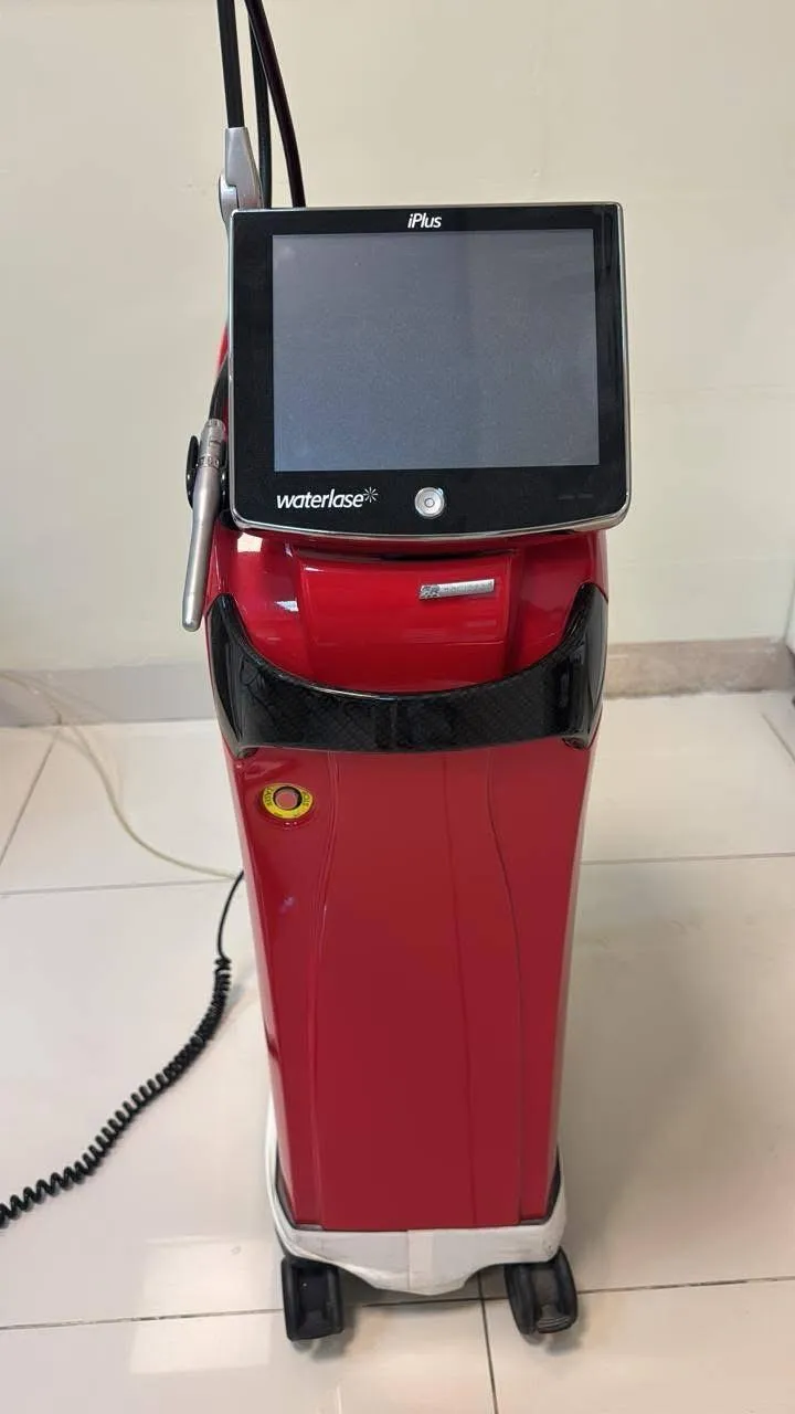 The Waterlase iPlus laser Dr. Nabeel works with